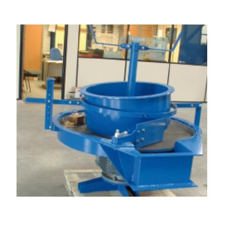 Machine de dosage du vrac à sole tournante