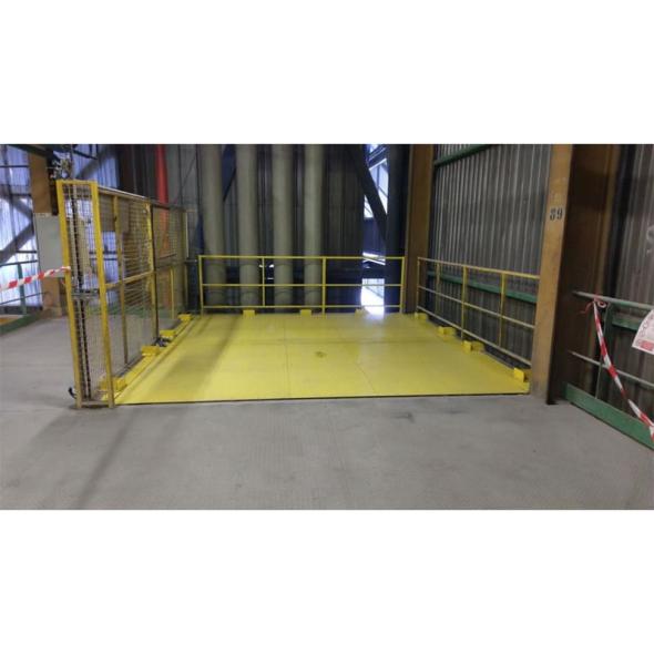 Trappe de sol de sécurité pour trémie de chargement